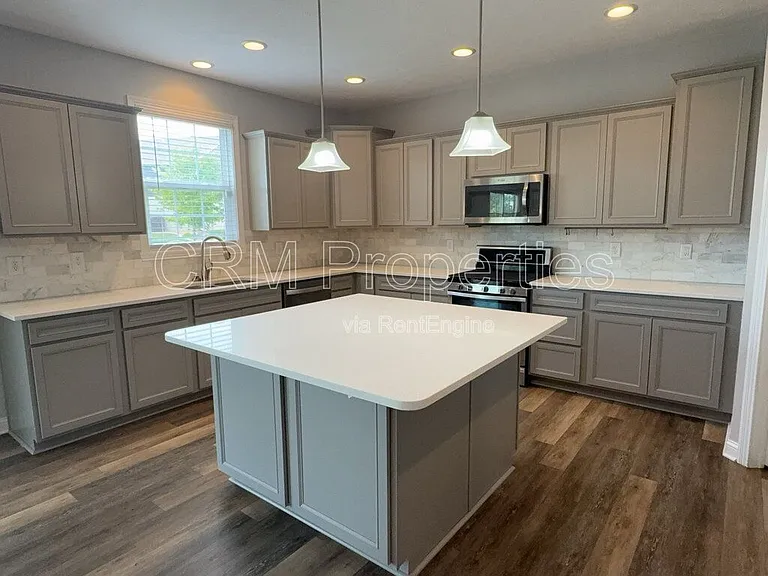 6311 Burgin Dr — Photo 20