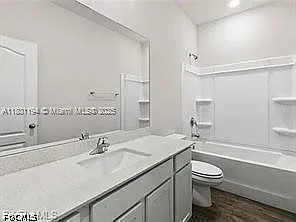 209 SE 26th Terrace Cpe — Photo 10