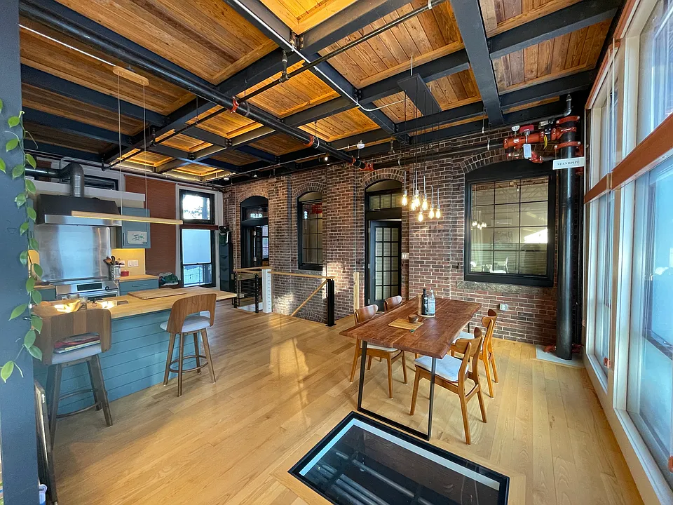 great room with architectural glass down to garden level