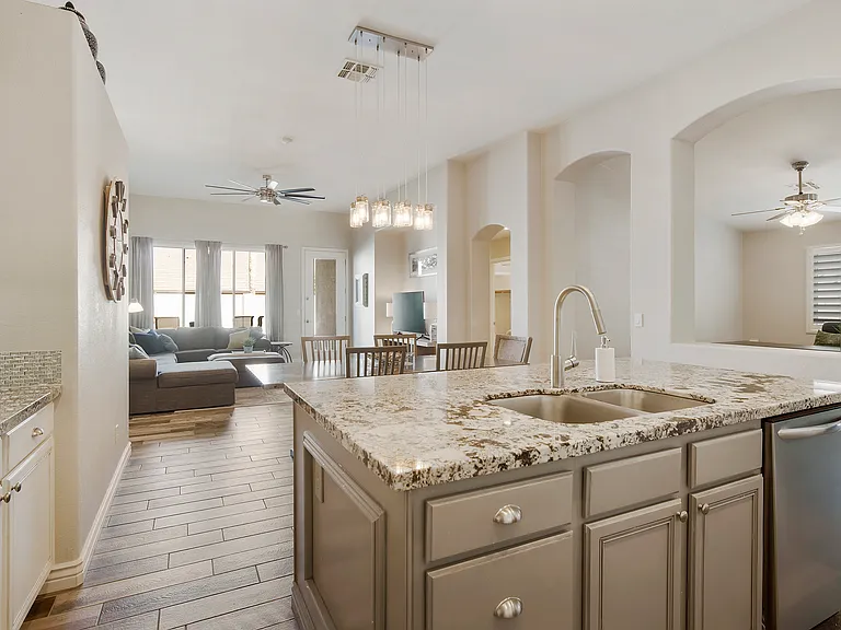 Open concept kitchen with dishwasher, microwave, gas stove and oven