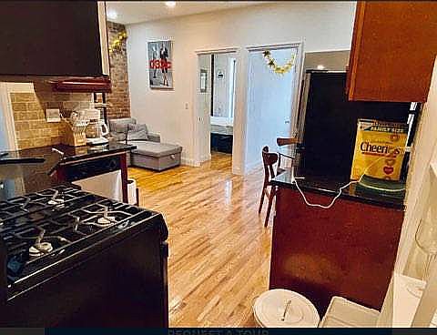 1st image of 114 E 1st St APT 13
