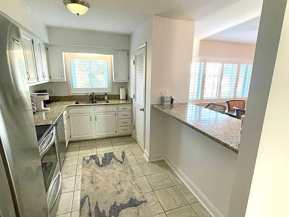 Spacious kitchen with ample space.