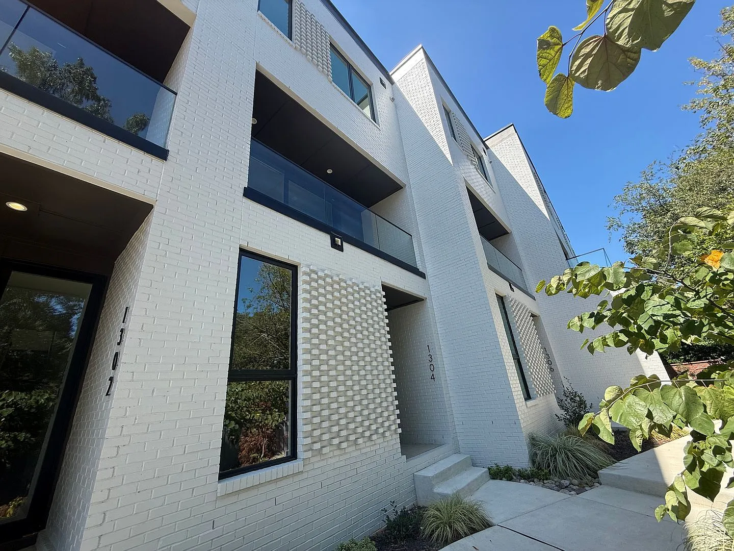 Luxurious New Construction 4BD, 2.5BA Raleigh Townhome with a 1-Car Garage & Rooftop Terrace in a... — Photo 1