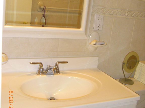 Large bathroom with tub & shower and lots of storage