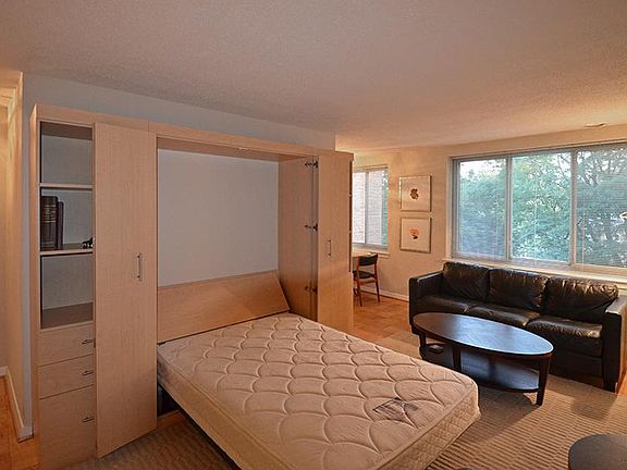 Living area with wall bed down