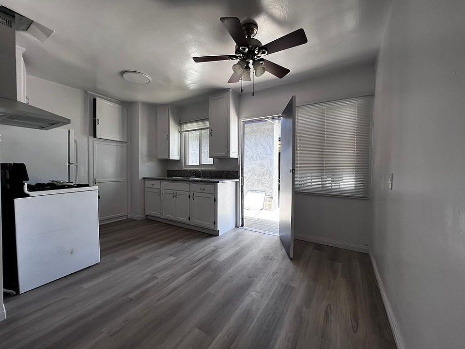 Kitchen + Dining + Rear Entrance