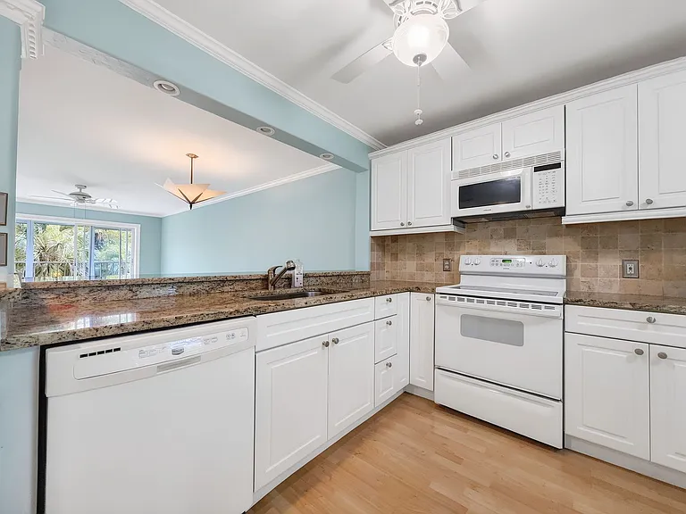 3041 Sandpiper Bay Cir #H201 — Photo 14