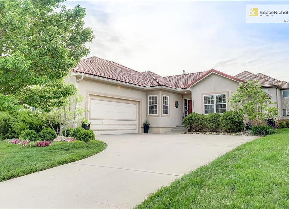 Tuscan style home with gorgeous landscaping