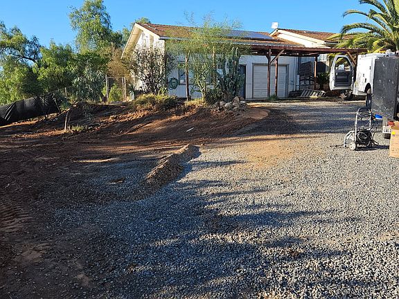 Front yard and parking area