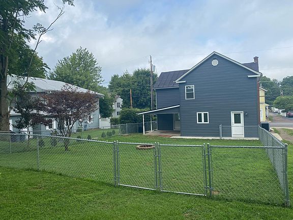 Backyard with a awesome fenced in area.