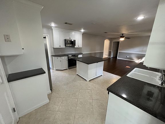 Kitchen - view is from Laundry Room door to Den - southwest to northeast
