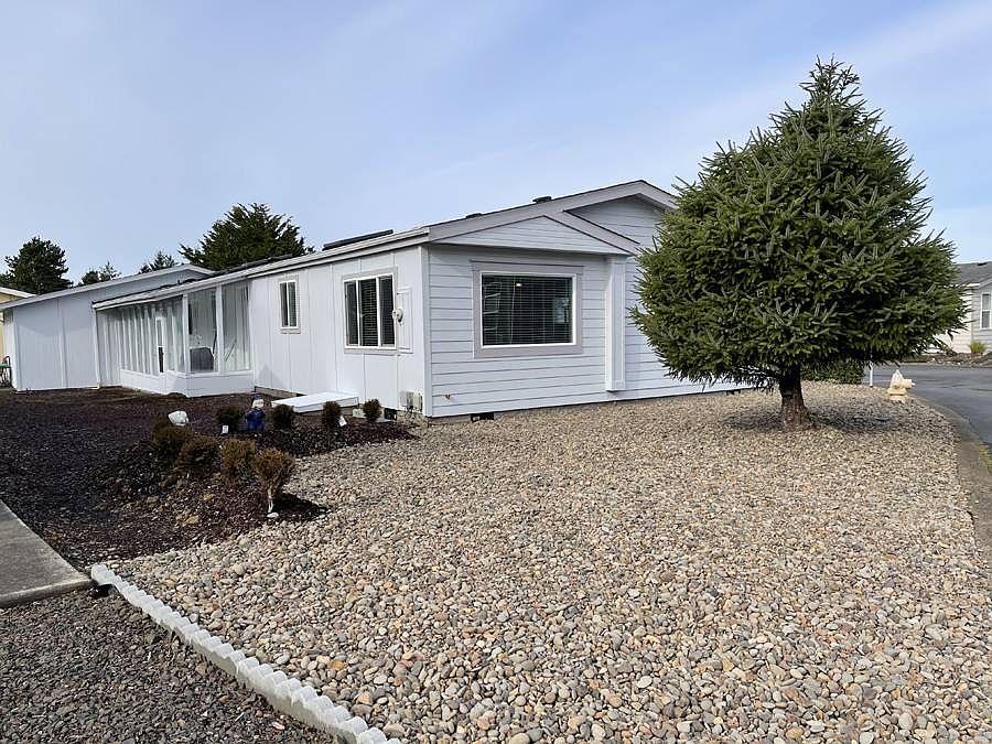 1st image of 6049 NE Evergreen Ln