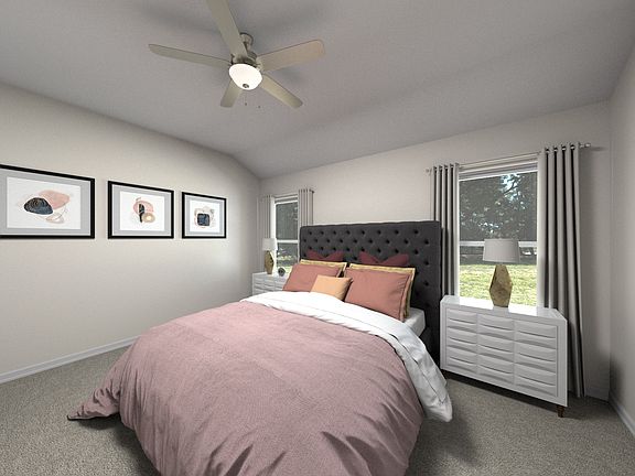 Enjoy the evening in your primary bedroom.