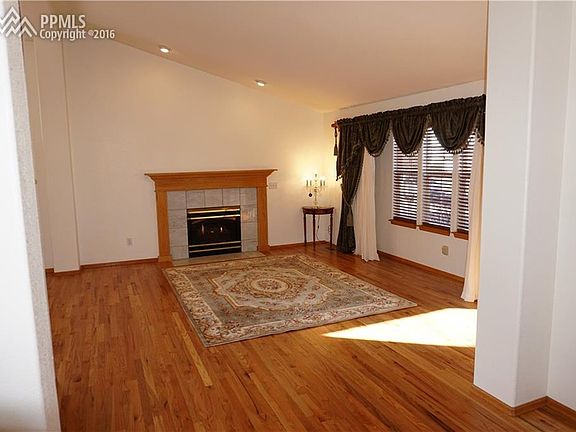 Gorgeous Wood Floors Throughout Main Level, Fireplace in Living Room.