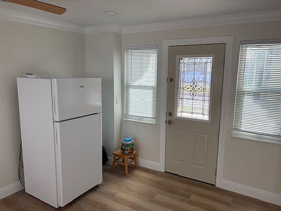 Kitchen with view of front door