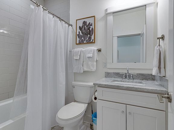 Private Tiled Bath for 1st Floor Bedroom. Also has a Hall Entry.