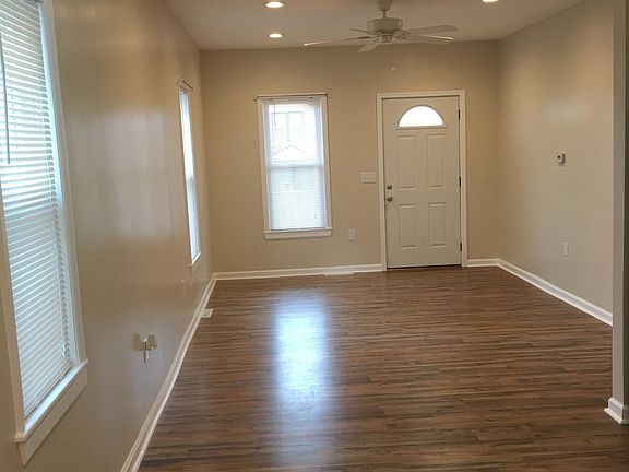 Living room with front door entrance, Lots of light, window