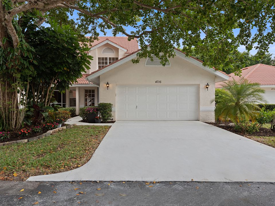 Storybook entry with garage 