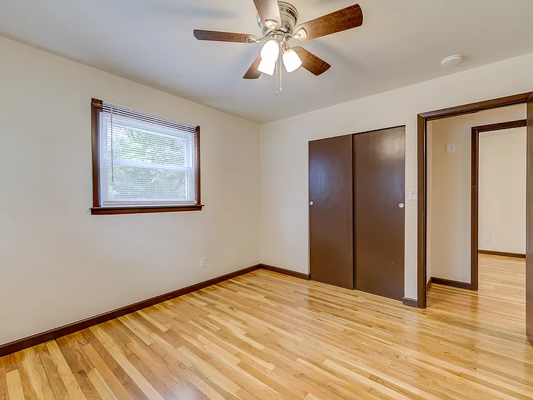 Front bedroom with new ceiling fans and ALL of the main floor is recently painted.