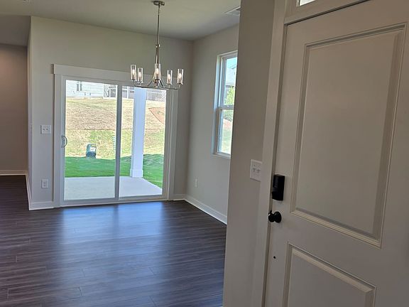 Front Door and Dining Area with Walkout Porch