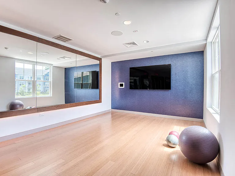 Our expansive 24-hour fitness center is complete with a tranquil yoga studio
