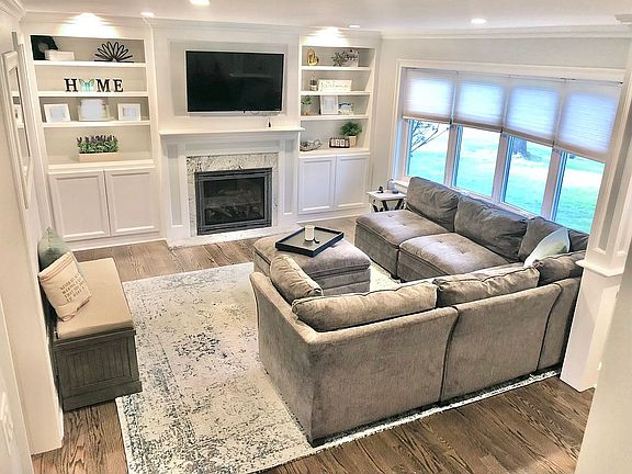 Living room w/custom built i