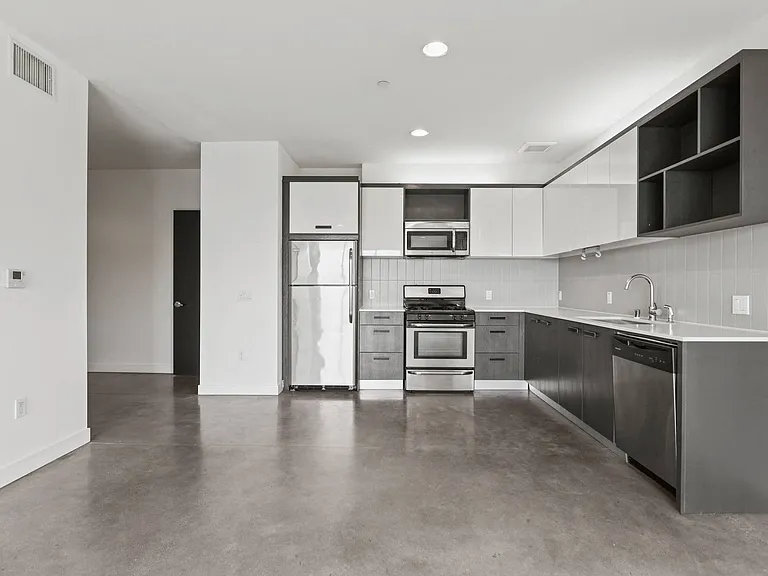 Open-Concept Kitchen with Stainless-Steel Appliances