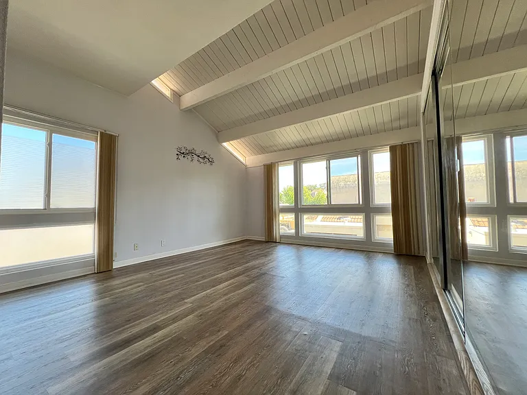 1st Bedroom with Mirrored Closet Doors