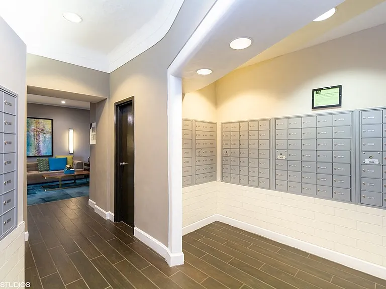 Secure mail room with individual lockers