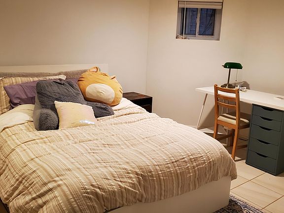 Bedroom (angle #3) can comfortably fit a queen size bed, a desk, and other furniture.