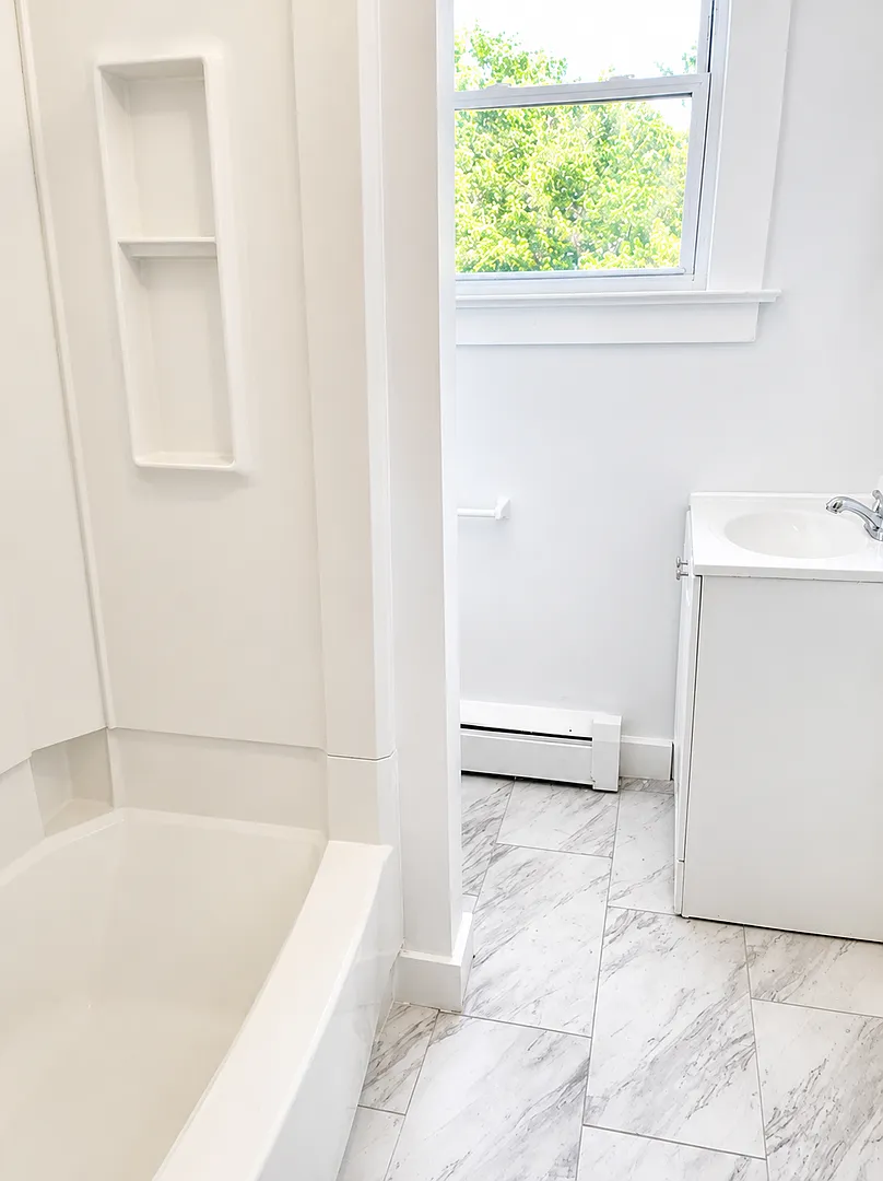Updated 3-Bedroom Apartment For Rent — Photo 4
