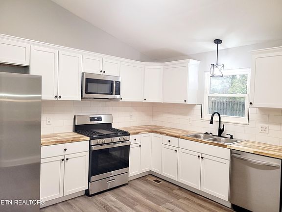 4th image of 7615 Windwood Dr