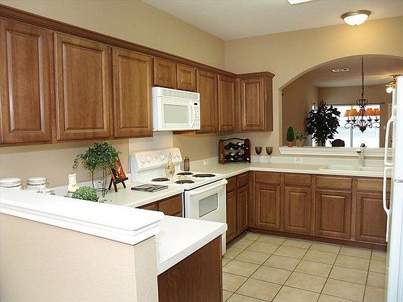 Great Kitchen with Dark Wood Cabinetry. All Appliances Convey!