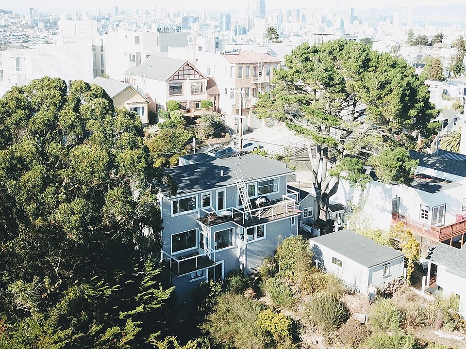 The house sits on a tripple lot with it's own forrest