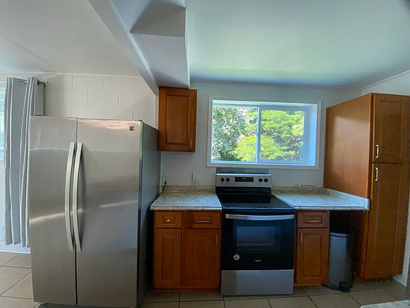 Current Kitchen setup- Being replaced with a whole new layout, new cabinets, new countertops, windows replaced and new appliances!