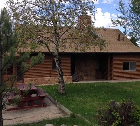 Back, south facing patio area, note enclosed porches with so