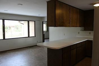 Adjacent to the great room is a large kitchen with a wonderful window offering another great view of the back yard.