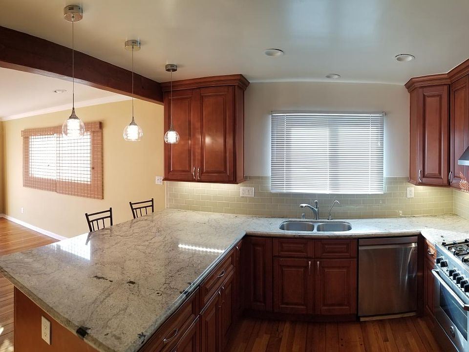 Open Plan Remodeled Kitchen and Dining Room