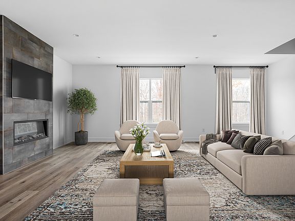 Spacious Living Area w Electric Fireplace