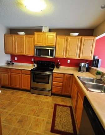 Kitchen, upgraded stainless steel appliances & beautifully painted backsplash!