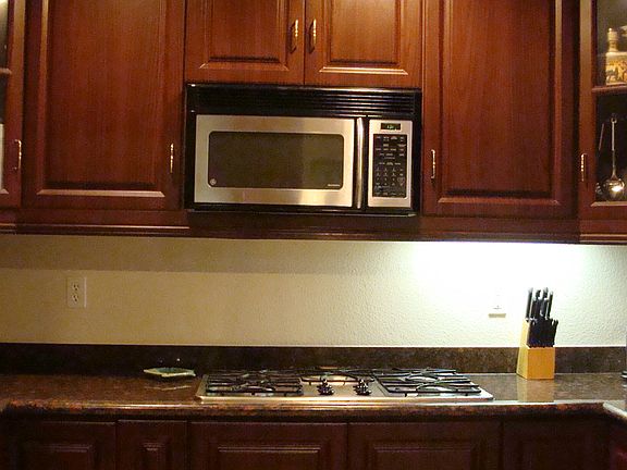 Remodeled kitchen with granite and stainless appliances
