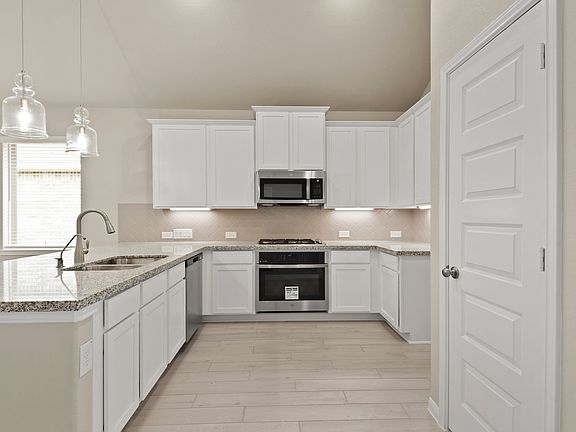 Lovely kitchen with pendant lights