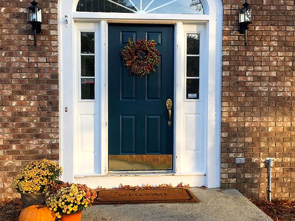 Front door with arched frame