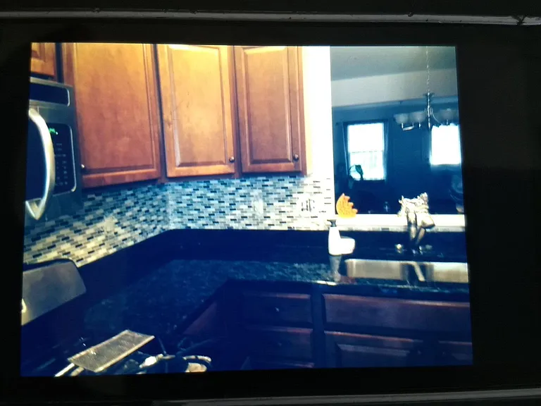 Kitchen with granite counter-tops , Big Island & Back-splash
