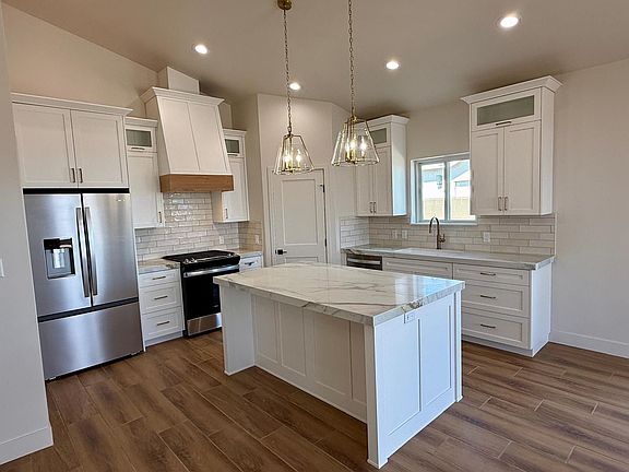 4th image of 10717 E 46th Pl