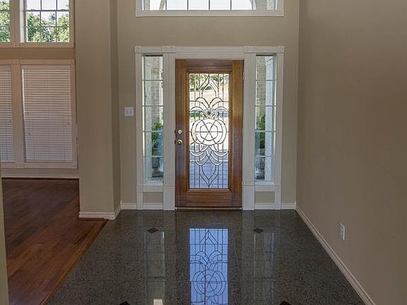 Upon entering the home, you will notice how its south-facing location provides beautiful natural lighting. Look up at the tall ceilings and beautiful detail.