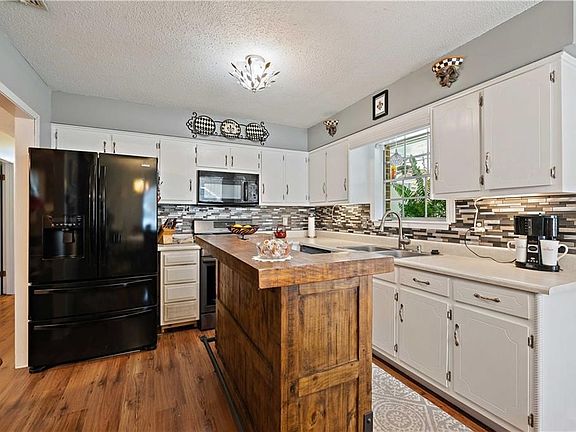 4th image of 5661 Woodchase Cir E