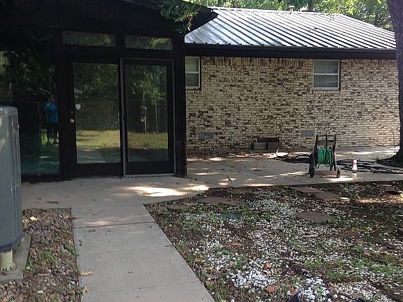 Back of home-sunroom/patio