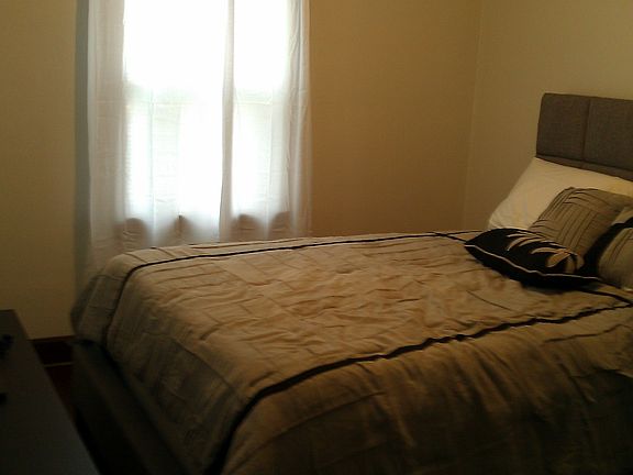 Queen Sized Bed and Entertainment Center