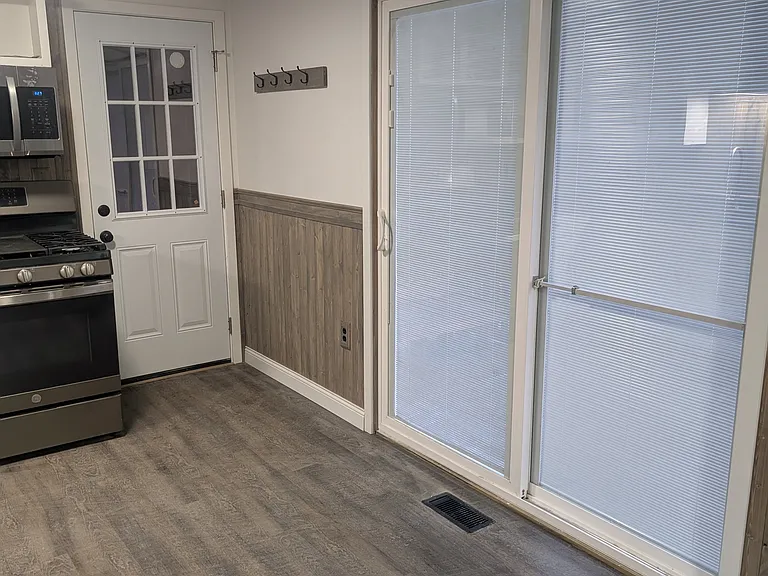 kitchen to attached garage and to outside.